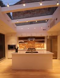 Plafond Lumineux Grandes Verrieres De Toit Et Lampes Electriques Dans La Cuisine 31 Best Modern Ki Dream Kitchens Design Modern Kitchen Lighting House Styles