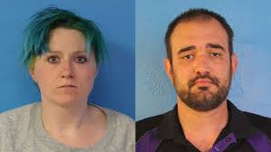 Man, woman charged after 2-year-old found saturated in urine and dirt,  police say