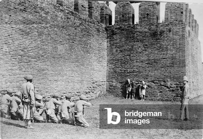 Image of Execution of Burmese dacoits at Mandalay. A glass copy negative