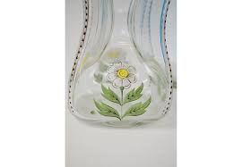 Not available at clybourn place. A Tall Turquoise Glass Vase 45cm H And A Pair Of Painted Decanters Of Pinched Design 33cm H 3