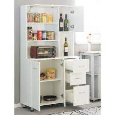 Placing a pantry cabinet in an adjacent space just outside the kitchen creates more space for cooking. Basicwise White Kitchen Pantry Storage Cabinet With Doors And Shelves Qi003729l The Home Depot
