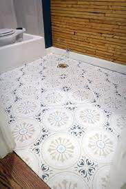 How To Stencil Paint A Ceramic Tile Floor The Cheaper Way Ceramic Floor Tiles Painting Ceramic Tile Floor Stenciled Tile Floor
