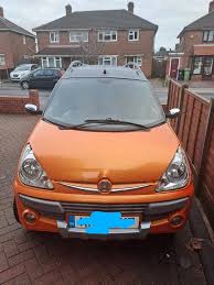 Image result for Orange 2010 Aixam-Mega