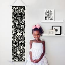 personalized canvas growth chart with floral bone inlay design in black perfect for boho baby girls nursery or baby shower gift