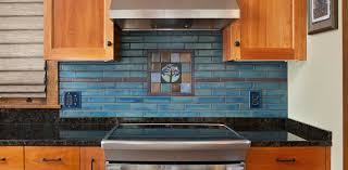 arts & crafts tile mural behind stove