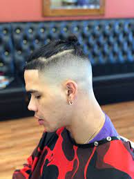 This idea means that your hairline and the beard line are discontinued by the fact that you have shaved a portion of your hair in the middle. Bald Fade Barber