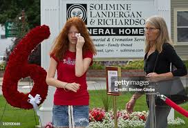 Victoria Glidden and her grandmother, Debra Glidden, leave the wake... News  Photo