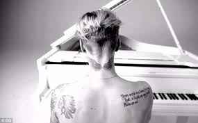 Justin Bieber Explains His Many Tattoos Admits To Trying To Cover His Selena Tat Popstartats Justin Bieber Wings Tattoo Justin Bieber Tattoos Neck Tattoo