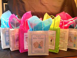 What To Put In Baby Shower Gift Bags For Guests 27 Awesome Ideas Baby Shower Gift Bags Baby Shower Baby Shower Favors