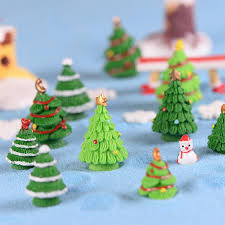 These homeowners have simply arranged some holly in a basket, adding pinecones for variety. 10 Pcs Resin Christmas Trees Figures Miniature Fairy Diy Landscape Figurine Christmas Decorations Buy At A Low Prices On Joom E Commerce Platform