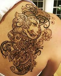 Black and white simple ganesha tattoo on right forearm. Ganesha Mehendi Beautiful Henna Designs Bridal Mehndi Designs Body Art