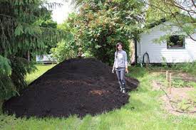 Composted Mixed Yard Waste Is A Wonderful Organic Garden Mulch Home For The Harvest Mulchtips Organic Mulch Organic Gardening Tips Organic Vegetable Garden