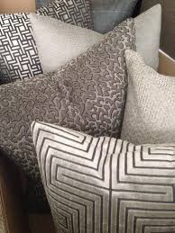 Home Owners Are Loving Taupe Silver Accents To Brighten Up Their Homes This Shade Coordinates With Chocolate Pillows Elegant Pillow Living Room Decor