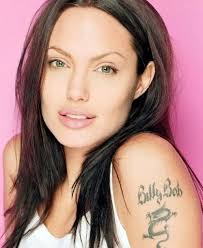 Angelina jolie is frequently heralded as the most tattooed celebrity with more than fifteen tattoos, including those that have been removed or covered by more recent designs. Angelina Jolie S 21 Tattoos Their Meanings Body Art Guru