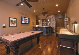 Game Rooms For Any Style Of Play Game Room Family Game Room Bar Small Game Rooms