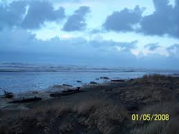 storm driven high tide nearly covers entire beach picture