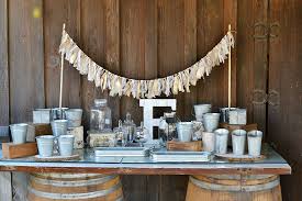 Adding a sweets station to your reception food menu is a great way to stretch a dessert budget, especially if you have a large guest list and can't afford a big wedding cake. Rustic Wedding Candy Buffet