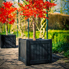 The 'versailles', or orange tree planter is a stunning planter with ball finials and mouldings to give it a truly classic look. Versailles Planters