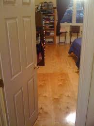 rug in kitchen with hardwood floor