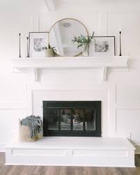 I just cleaned the surface with a damp rag and then used the large if you don't think you can handle freehand work, try a small stencil and a sponge pouncer to add your pattern. Diy Fireplace Makeover Katie Lamb