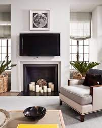 7 Ideas To Decorate Your Fireplace And Mantel For Any Season Living Room With Fireplace Fireplace Decor Trendy Living Rooms