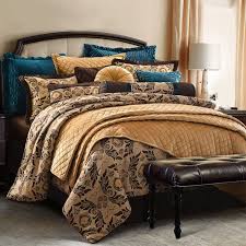 Comforter, 2 shams, 1 cushion, 1 breakfast cushion super soft velvet comforter with a gorgeous metallic champagne gold printing with complimenting embroidered decorative cushions to complete the style Loretta Comforter Sets