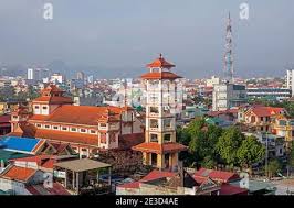Pagoda and temple in the city Ninh Binh in the Red River Delta of northern  Vietnam Stock Photo