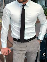 White Shirt And Black Tie In 2020 Business Attire For Men Mens Dress Outfits Formal Men Outfit