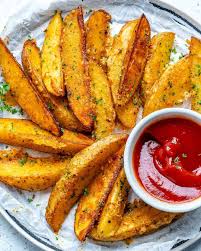 Garlic Parmesan Baked Potato Wedges Recipe In 2020 Potato Wedges Baked Potato Wedges Healthy Fitness Meals