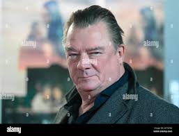 Leipzig, Germany. 29th Nov, 2022. German actor Peter Kurth comes to the  world premiere of the film "The silent satellites" in the Passage cinemas.  The film will be released