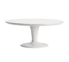 Made from stoneware, this round cake stand features a pedestal base, making it easy to hold and place on the table. Cambria Handcrafted Stoneware Cake Stand Pottery Barn