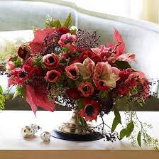 Pretty Christmas Flower Arrangement Arrange A Festive Bouquet For The Holidays Wi Christmas Flower Arrangements Christmas Floral Arrangements Christmas Floral