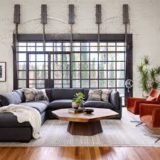 The clever interplay of thick peroba wood slabs creates a modern take on the modular coffee table. Brooklyn Asymmetrical Coffee Table