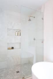 Lay bathroom wall tiles vertically when you want your room to look taller. White And Gold Marble Horizontal Shower Wall Tiles Transitional Bathroom