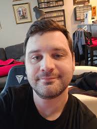 Does anyone know who the guy with the old camera doing photo shoots