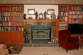 A folding wooden bookcase of dark stained birch or poplar. What To Do With These Wooden Built In Bookcases