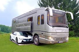 Volkner Mobil Luxury Motorhome Features A Built In Garage Under The Vehicle That Can Store A Car Recreational Vehicles Luxury Motorhomes Best Luxury Cars