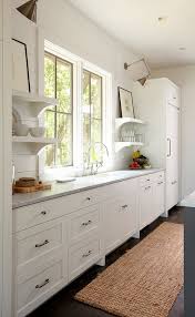 White Shiplap Walls And Open Shelving Replace Upper Cabinets In This Country Kitchen A Jute Runner Adds Kitchen Remodel Kitchen Interior Kitchen Inspirations