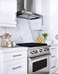 A solid slab will force you to be very diligent about what material to use and we find this as a great opportunity to showcase a special and dominant material that will make a statement in the kitchen. Marble Slab Backsplash Good Or Bad Idea