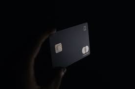 Please check the box to prove you are not a robot. Person Holding Black Card Photo Free Banking Image On Unsplash