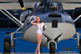 That S Gotta Be The Best Pirate I Ve Ever Seen Meme Helicopter Beautiful Model Stands In Front Of A Pby Catalina Boat Plane Aviacao Cacas Aviacao Civil