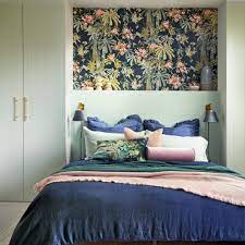 Baumann designed the plywood bed frame and shelving unit in the master bedroom, adjacent to in the master bedroom, a small, cramped closet was replaced with a wardrobe that is partially obscured. Small Bedroom Ideas How To Decorate And Furnish A Small Bedroom