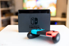 Includes the nintendo switch console and nintendo switch dock in black, with contrasting left and right joy‑con controllers—one red, one blue. Nintendo Switch Tips And Tricks Get More From Your Console