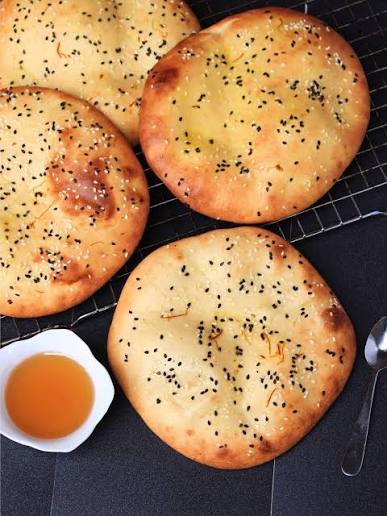 Thin ruqaq flatbread being prepared for Tharid Arabic bread stew
