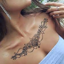 See more ideas about back henna, tattoos, henna. Underboobs Tattoo Ideas Golden Canvas Tattoo Art Studio Chest Tattoos For Women Body Art Tattoos Chest Tattoo Girl