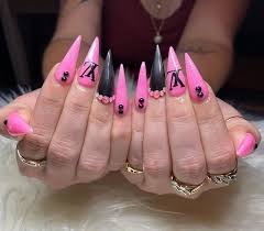 Light pink nails with balck flowers accented. 31 Hot Pink And Black Nail Designs For A Unique Look In 2021