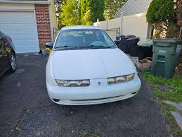 Image result for Bright Red 2000 Saturn