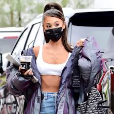 Ariana grande wore her classic ponytail to the 62nd annual grammy awards but with a twist. Can You Wear A Puffer In Summer Ariana Grande Says Yes Vogue