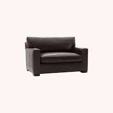 A chair and a half is an extremely comfortable and versatile piece of furniture that is larger than a standard armchair but smaller than a loveseat. Crate Barrel Axis Ii Leather Chair And A Half Aptdeco