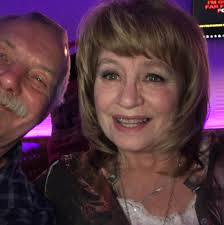 Should a husband defend his wife against his family's insults and  accusations?